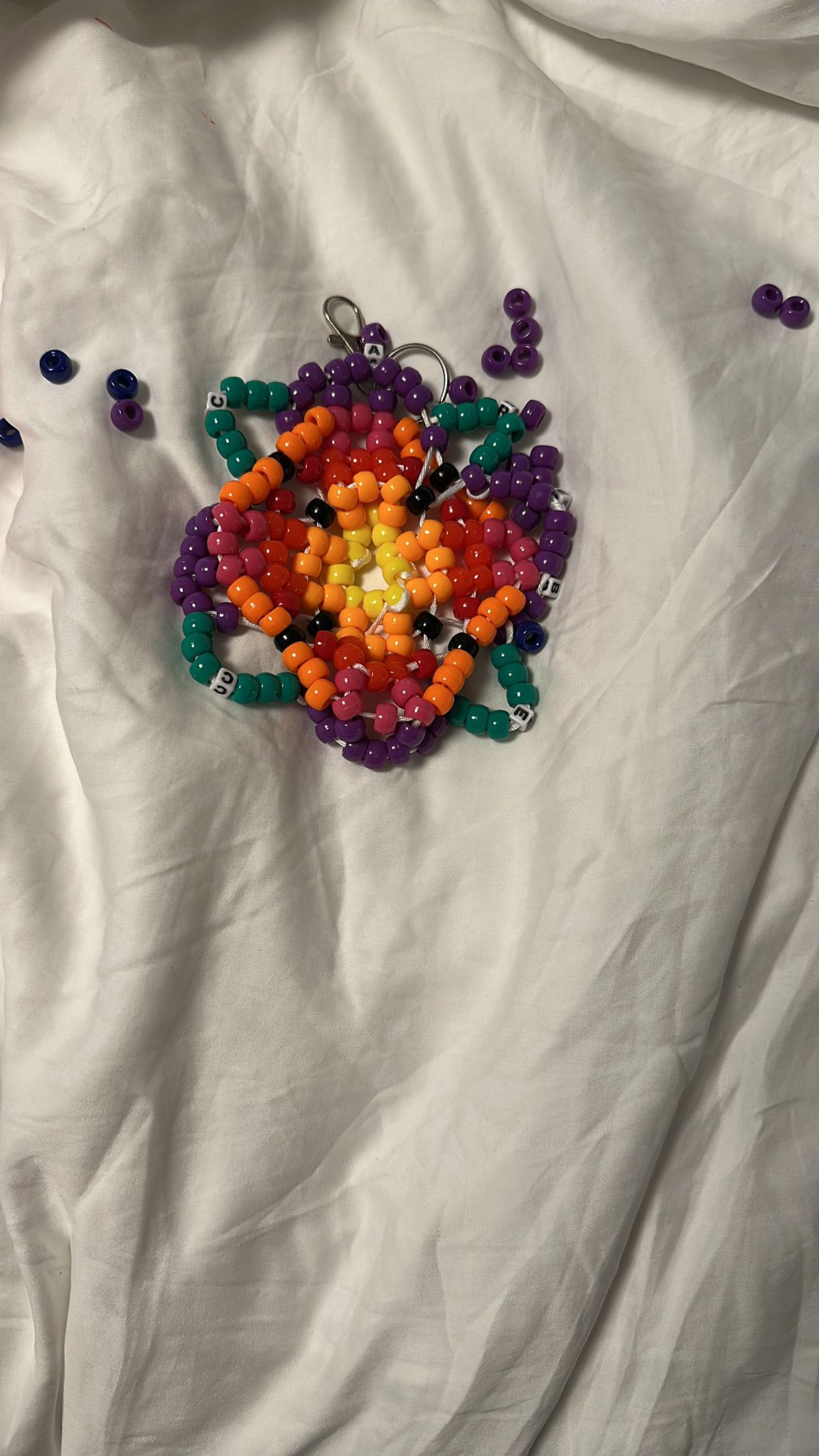 Purple handmade beaded flower
